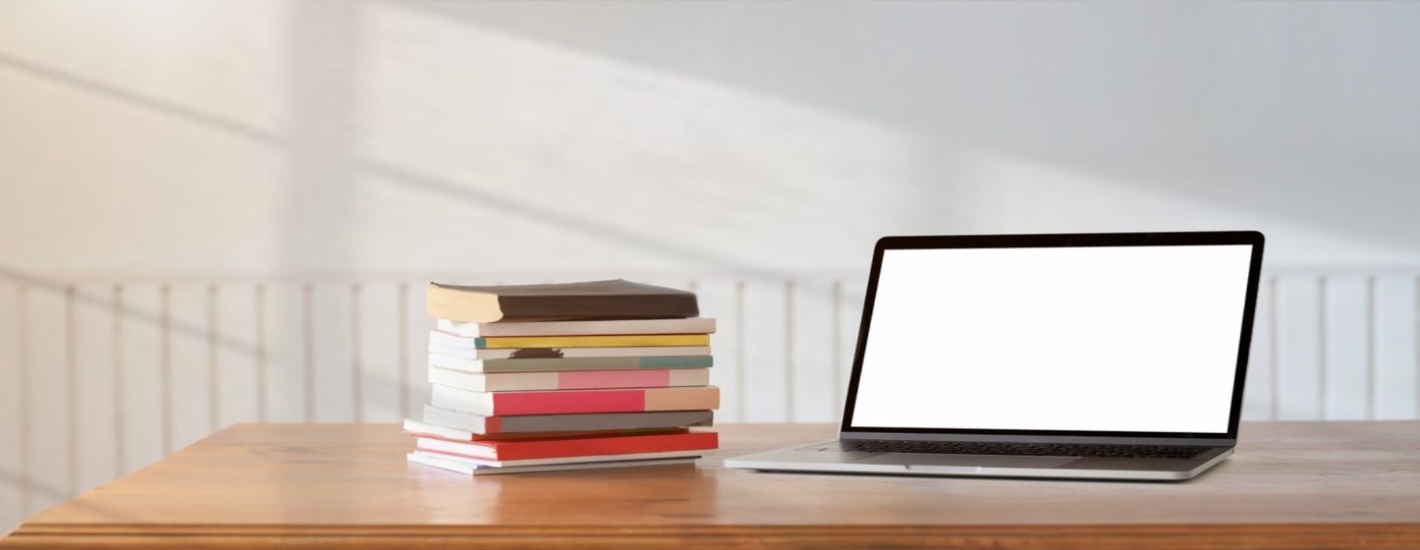 A desk with books